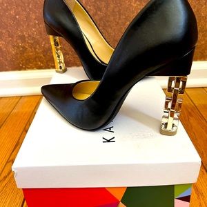 Katy Perry black stiletto with gold 4” heal